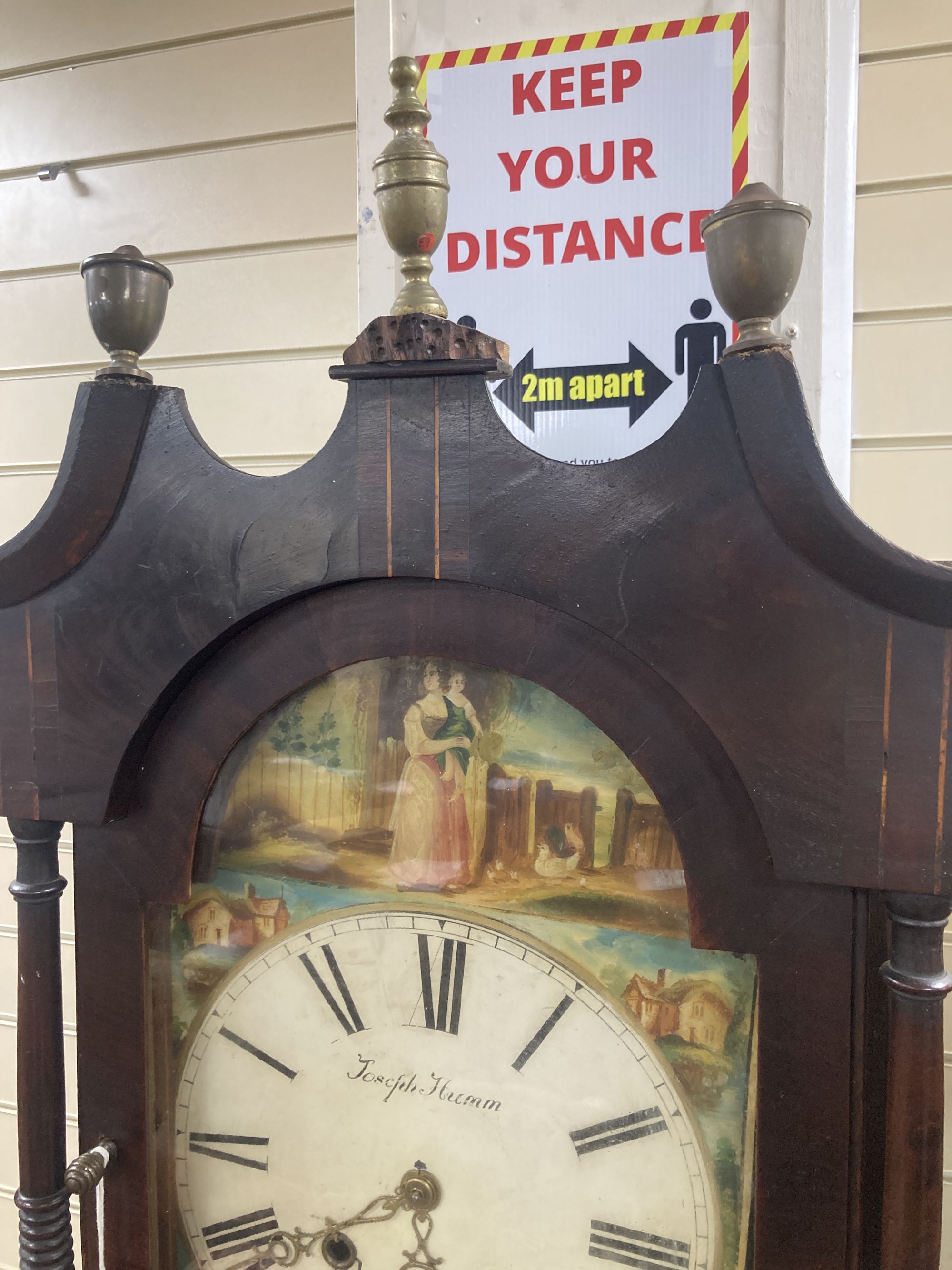 Joseph Humm[ell] of Peterborough. An early 19th century inlaid mahogany and oak eight day longcase clock, height 216cm